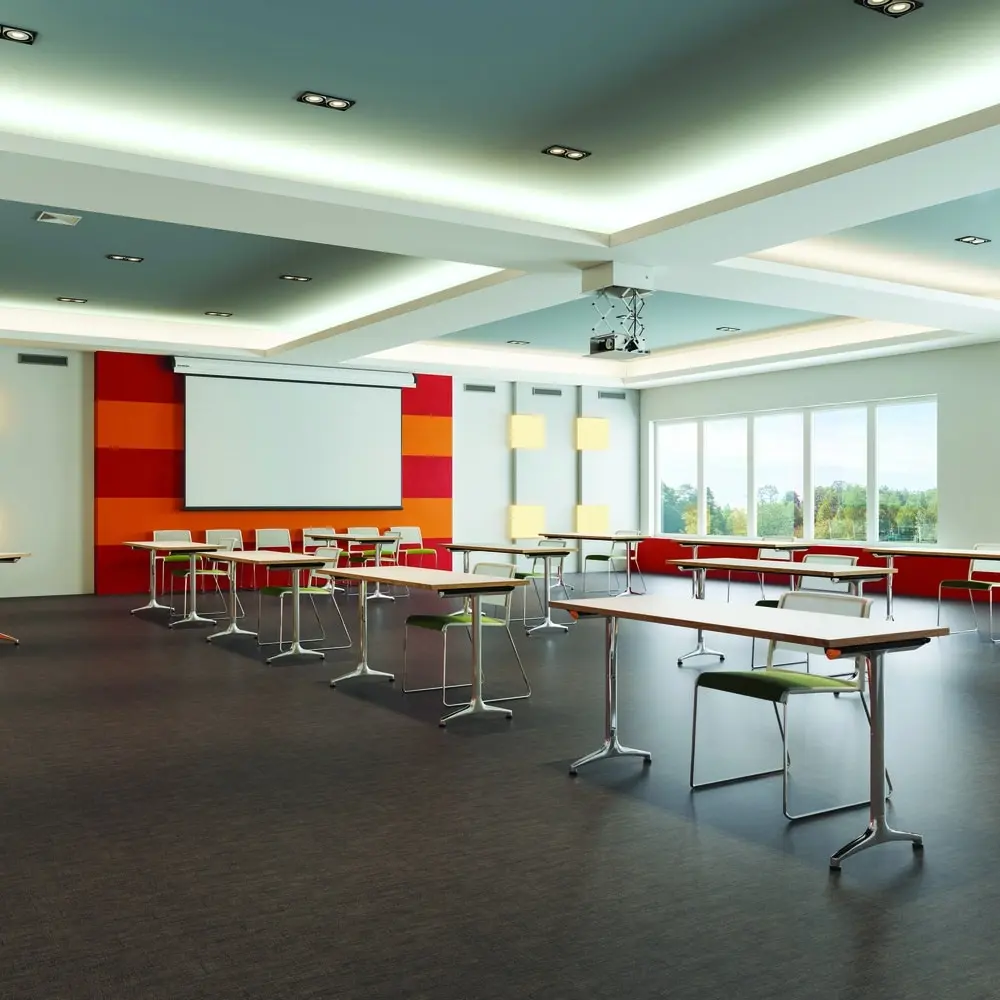 Education and training room with dark commercial flooring