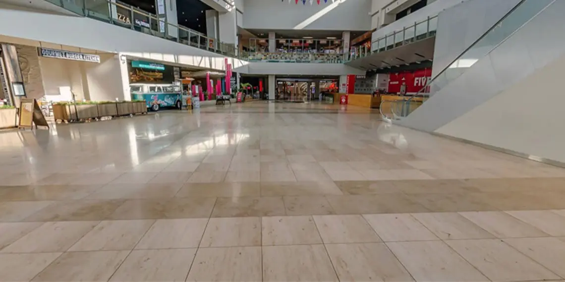 Shopping-centre interior with a hard-surface floor