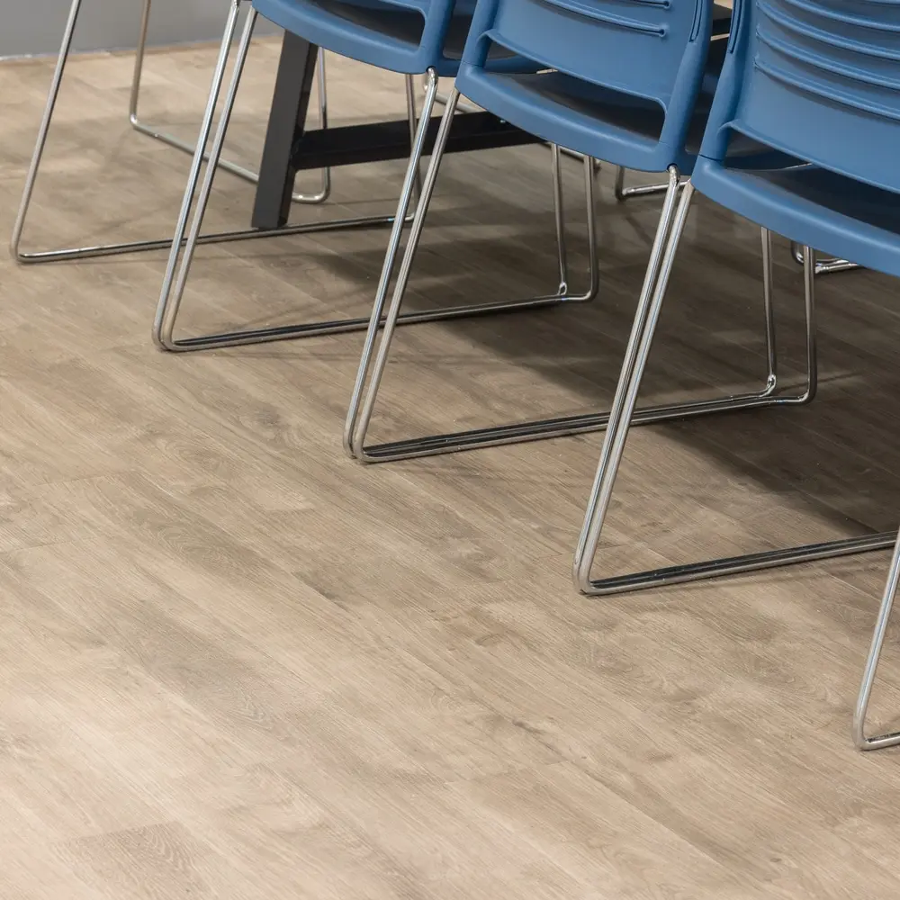 Wood-effect plank flooring in a furnished commercial interior
